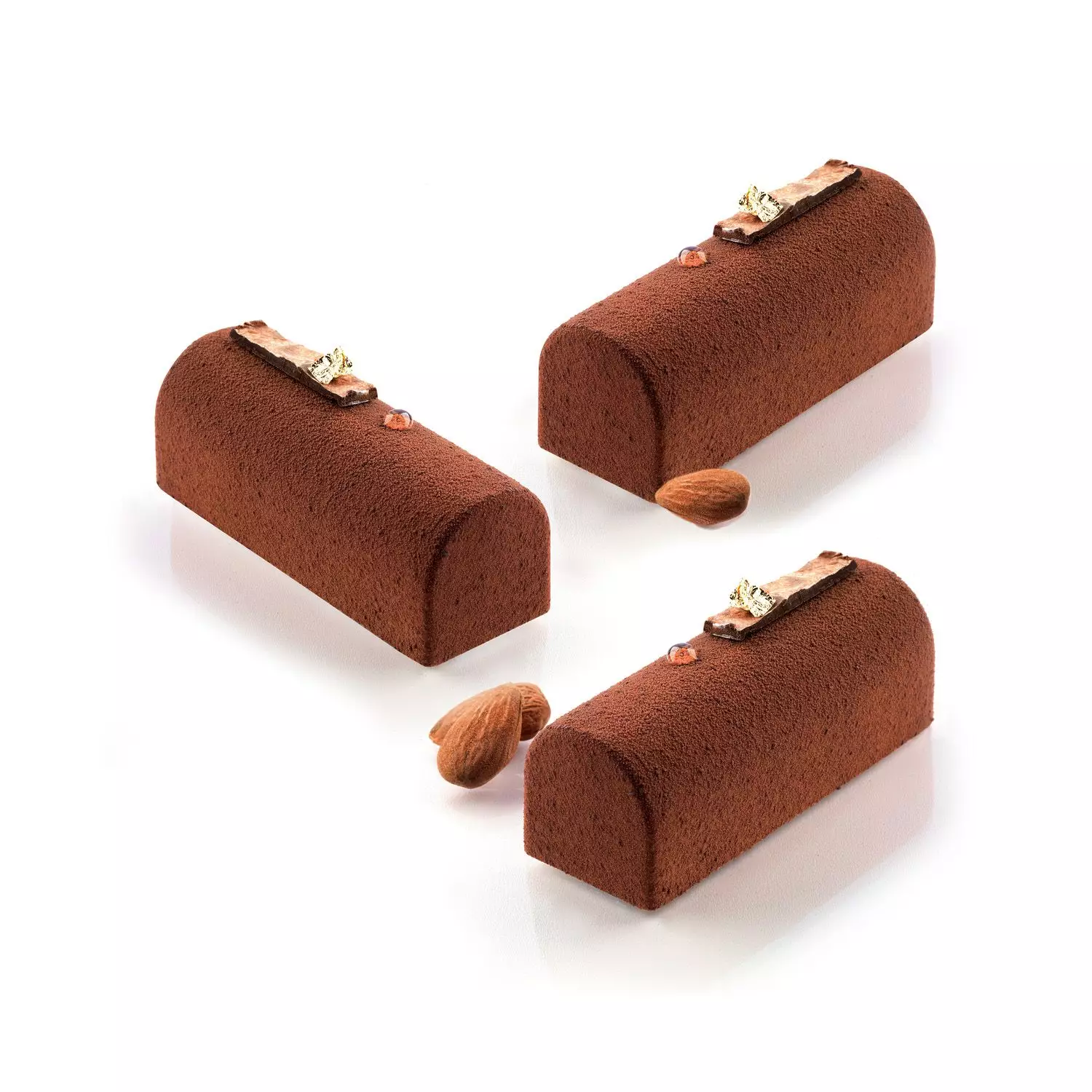 Moule Midi Bûche Silikomart avec 9 cavités de 84 × 32 × 35 mm en silicone platinum pour réaliser des bûchettes individuelles élégantes.