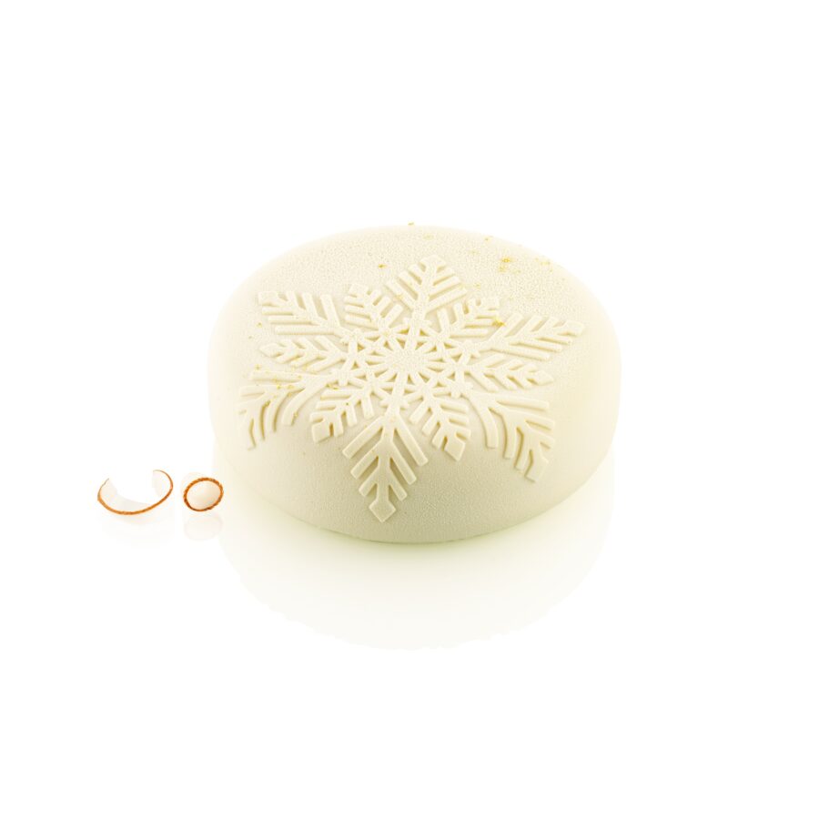 Moule Neve 1100 en silicone de Silikomart avec relief de flocon de neige, Ø170 mm x H53 mm, pour entremets élégants.
