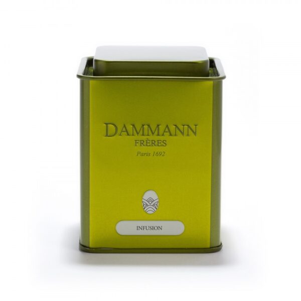 Boîte métallique vide Dammann Frères, capacité 100 g, couvercle hermétique, design décoratif, prête à accueillir une infusion.
