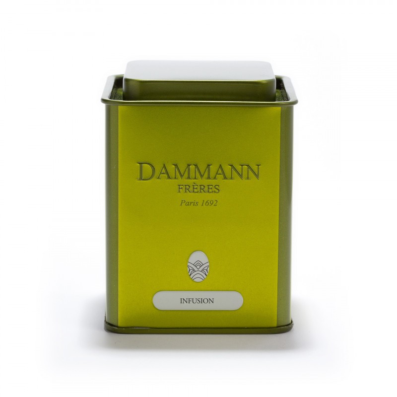 Boîte métallique vide Dammann Frères, capacité 100 g, couvercle hermétique, design décoratif, prête à accueillir une infusion.