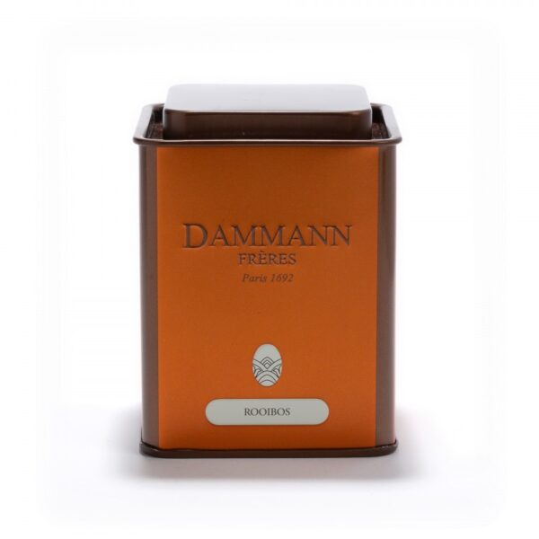 Boîte métallique vide « Rooibos » Dammann Frères, capacité 100 g, couvercle hermétique, décor orange-rouge, prête à accueillir une infusion sans théine.