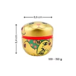 Boîte à thé métallique japonaise dorée avec motif Maneki Neko, chat porte-bonheur, hermétique et décorative, idéale pour conserver le thé en vrac.