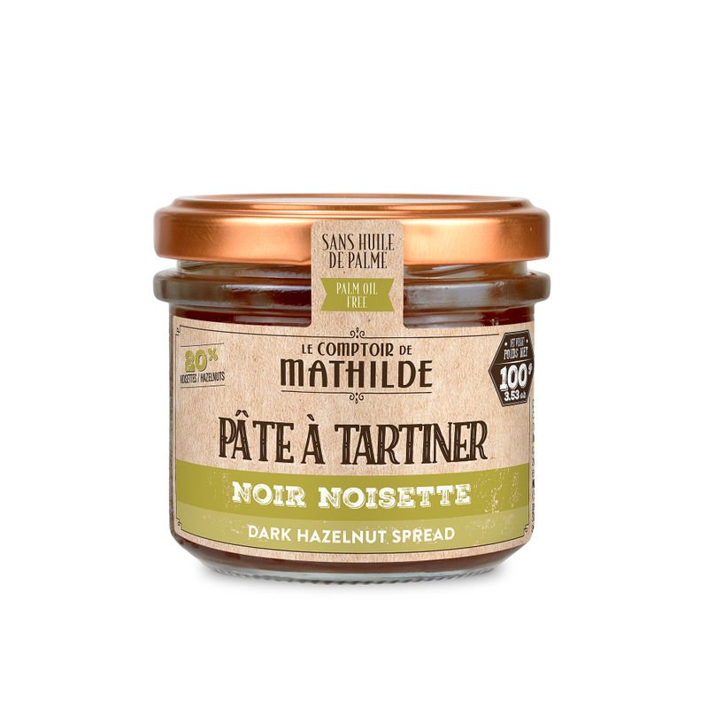 Pot de pâte à tartiner Noir Noisette, texture fondante et goût intense de noisettes, pour une gourmandise riche et authentique.