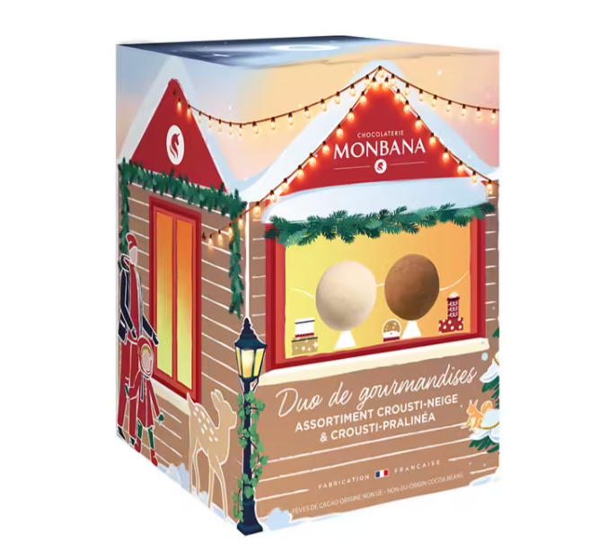 Boîte distributrice de Crousti-Neige Monbana contenant des billes croustillantes chocolat au lait et chocolat blanc, présentée sur fond clair.