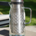Carafe filtrante Cookut Akua 1,2 L en verre avec filtre inox et granulés de charbon actif de coco