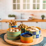 Service apéritif tournant Capri - TABLE PASSION Service apéritif 6 pièces Capri 31 cm Table Passion – plateau rond en porcelaine décorée multicolore avec 6 bols assortis pour apéro convivial.